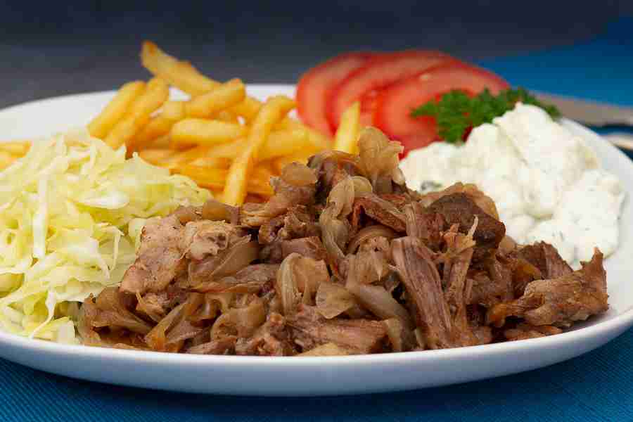 onion meat with fries and cabbage salad
